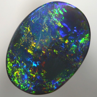 SOLID BLACK OPAL Copper fire contrasts with crisp green and blue